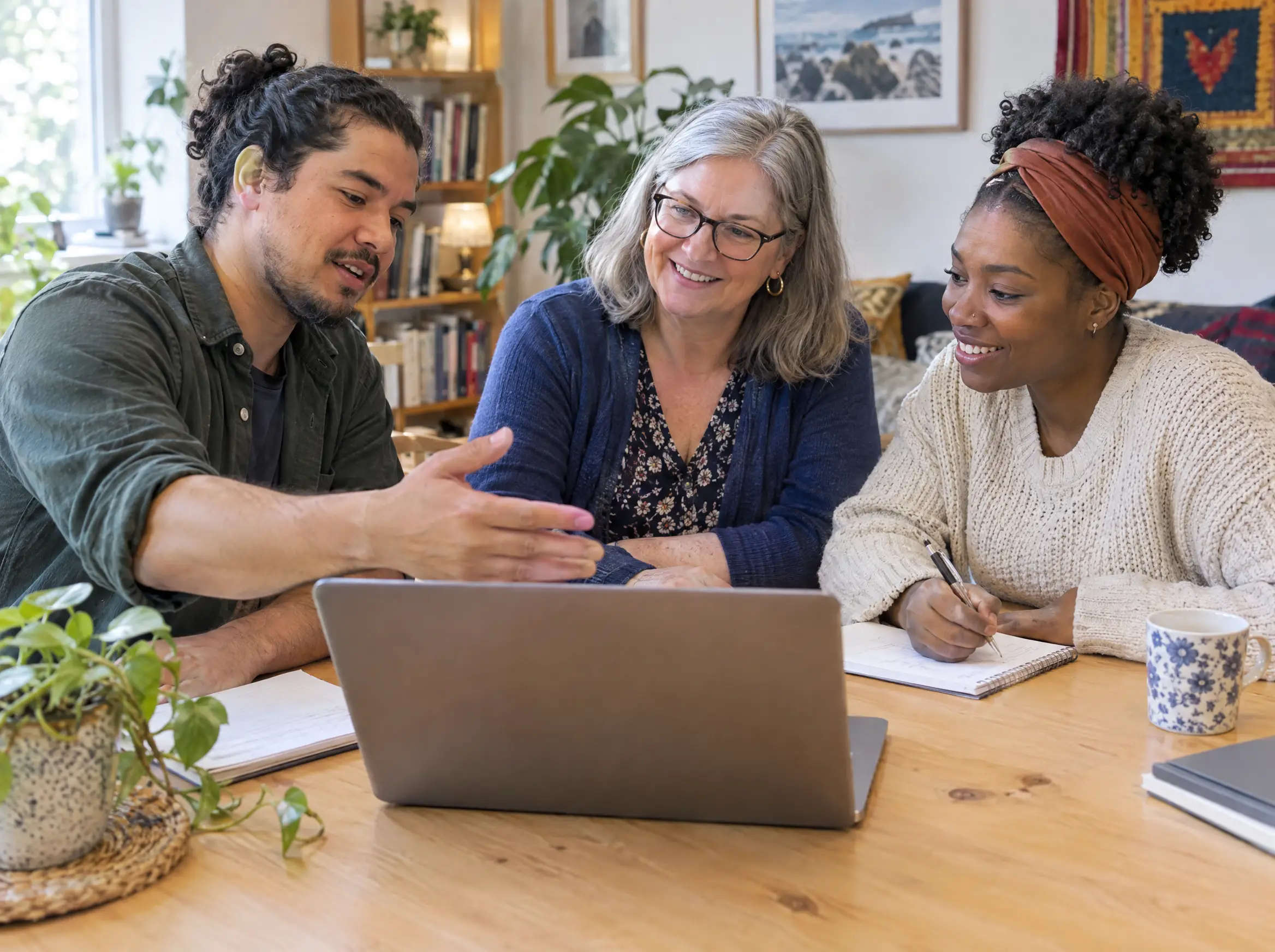 Staff at a Deaf community center trying the beta together on a laptop